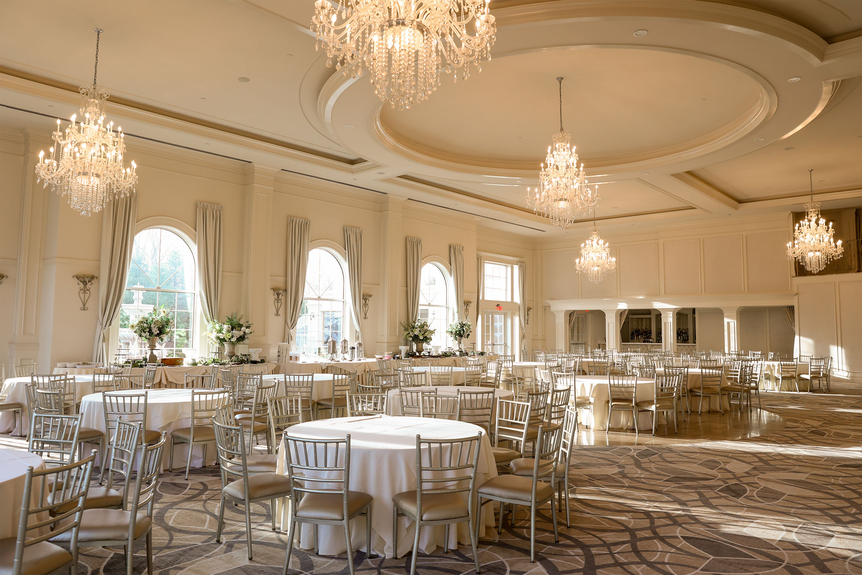 aria ball room with tables and chairs 