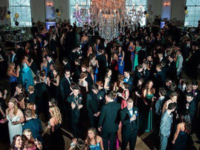 students dancing at prom in the aria ballroom